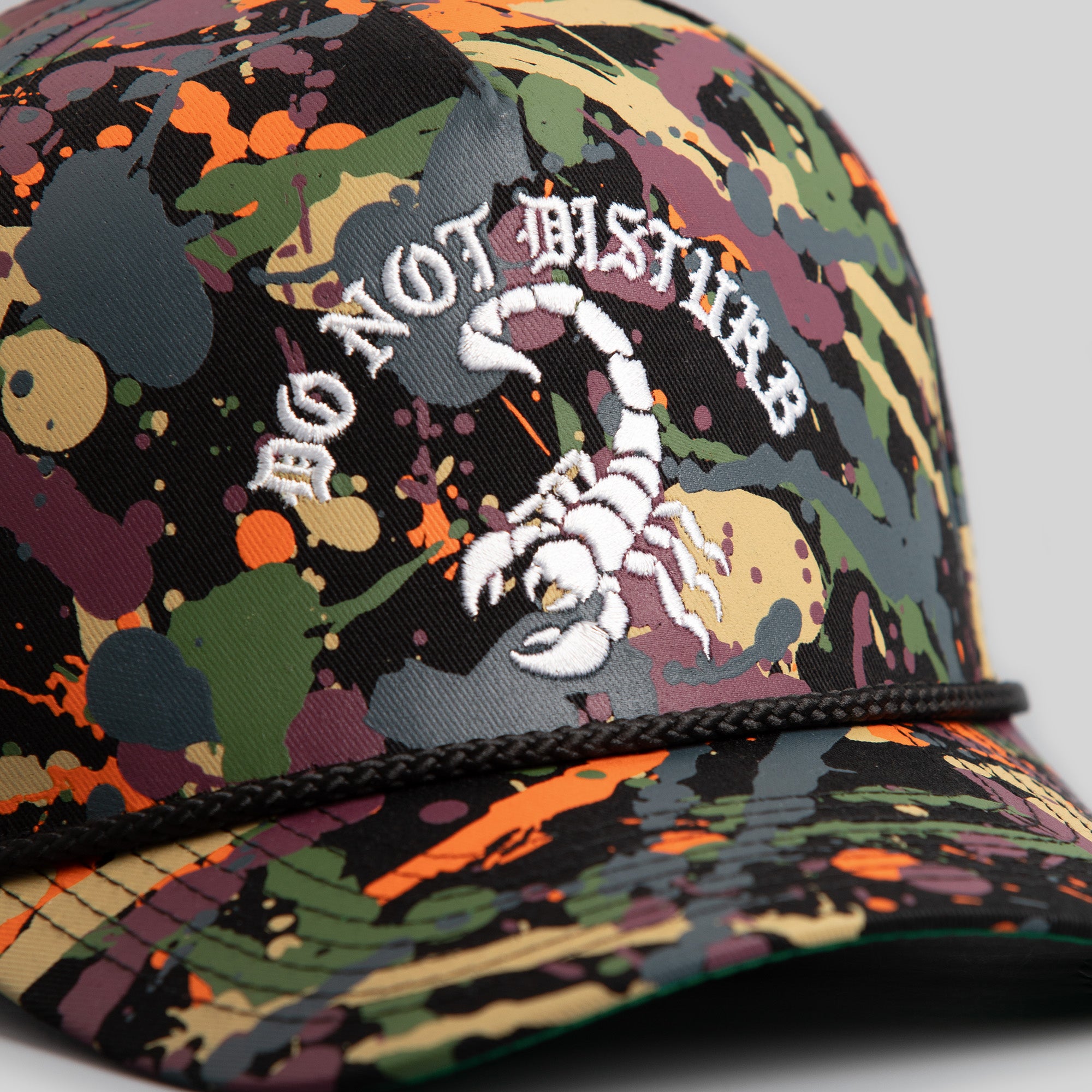 DO NOT DISTURB OLIVE SPLATTER TRUCKER HAT