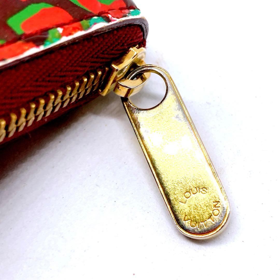 818 ルイヴィトン モノグラム　レオパード　折り財布　ジッピーパース