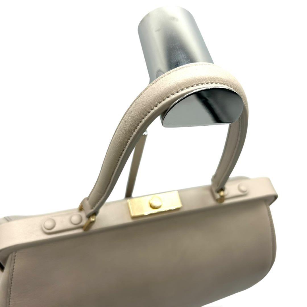 美品 1593 agnes b. ハンドバッグ がま口 ゴールド金具 ベージュ