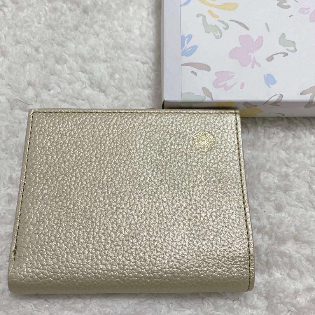 皇居 シャンパンゴールド 二つ折り財布 牛革 箱付き がま口 菊 - メルカリ